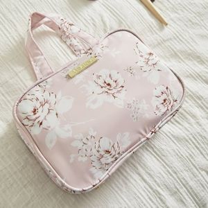 Yumi Kim hanging travel bag